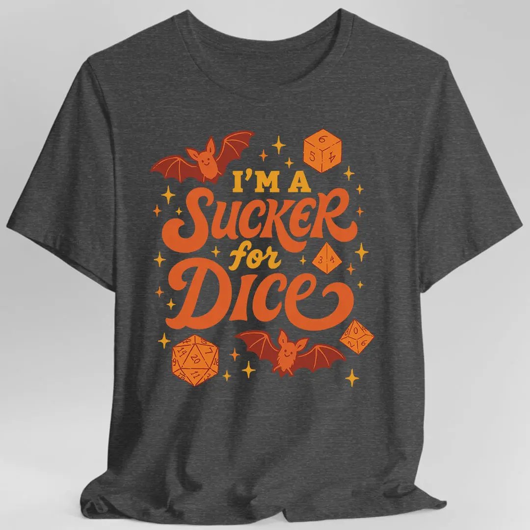 Dark heather T-shirt by Sunburst RPG with a playful "I'm a Sucker for Dice" graphic, perfect for tabletop gaming fans.