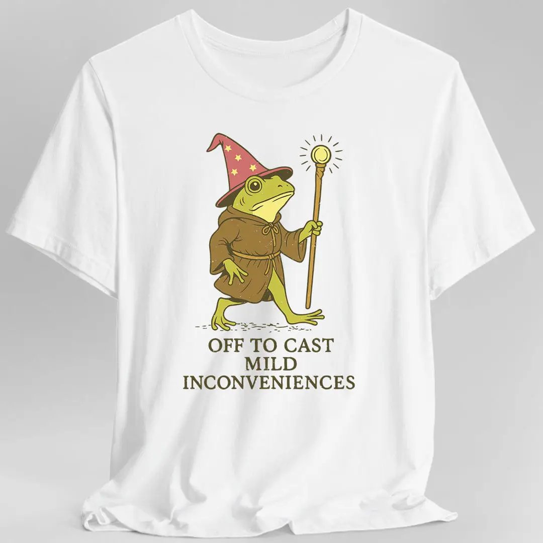 White Sunburst RPG Off to Cast Mild Inconveniences T-Shirt featuring a wizard frog graphic, casual fit, and soft fabric.