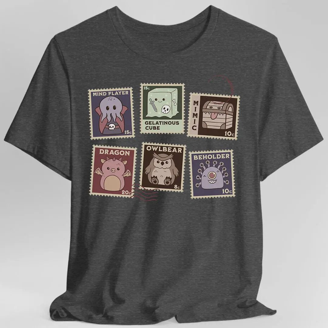 Dark heather D&D Monster Stamps T-Shirt by Sunburst RPG featuring colorful fantasy monster designs on front.