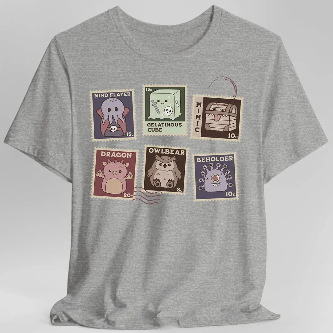 Sunburst RPG D&D Monster Stamps T-Shirt in sport grey featuring colorful fantasy monster stamp designs on the front.