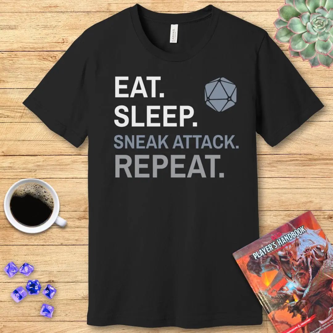 Sunburst RPG Rogue T-Shirt featuring "Eat, Sleep, Sneak Attack, Repeat" graphic, casual fit and comfortable fabric.