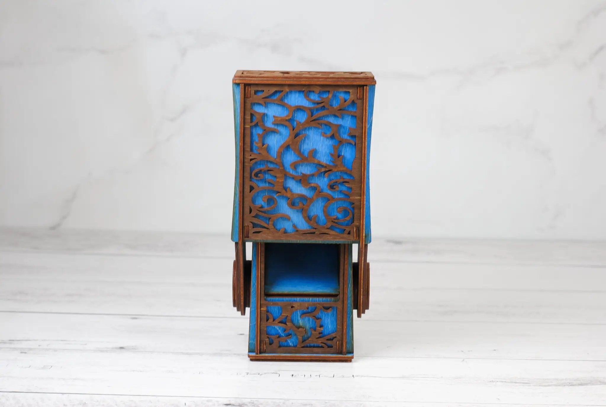 Black Talon & Claw collapsible dice tower with adjustable height for tabletop gaming and dice rolling.