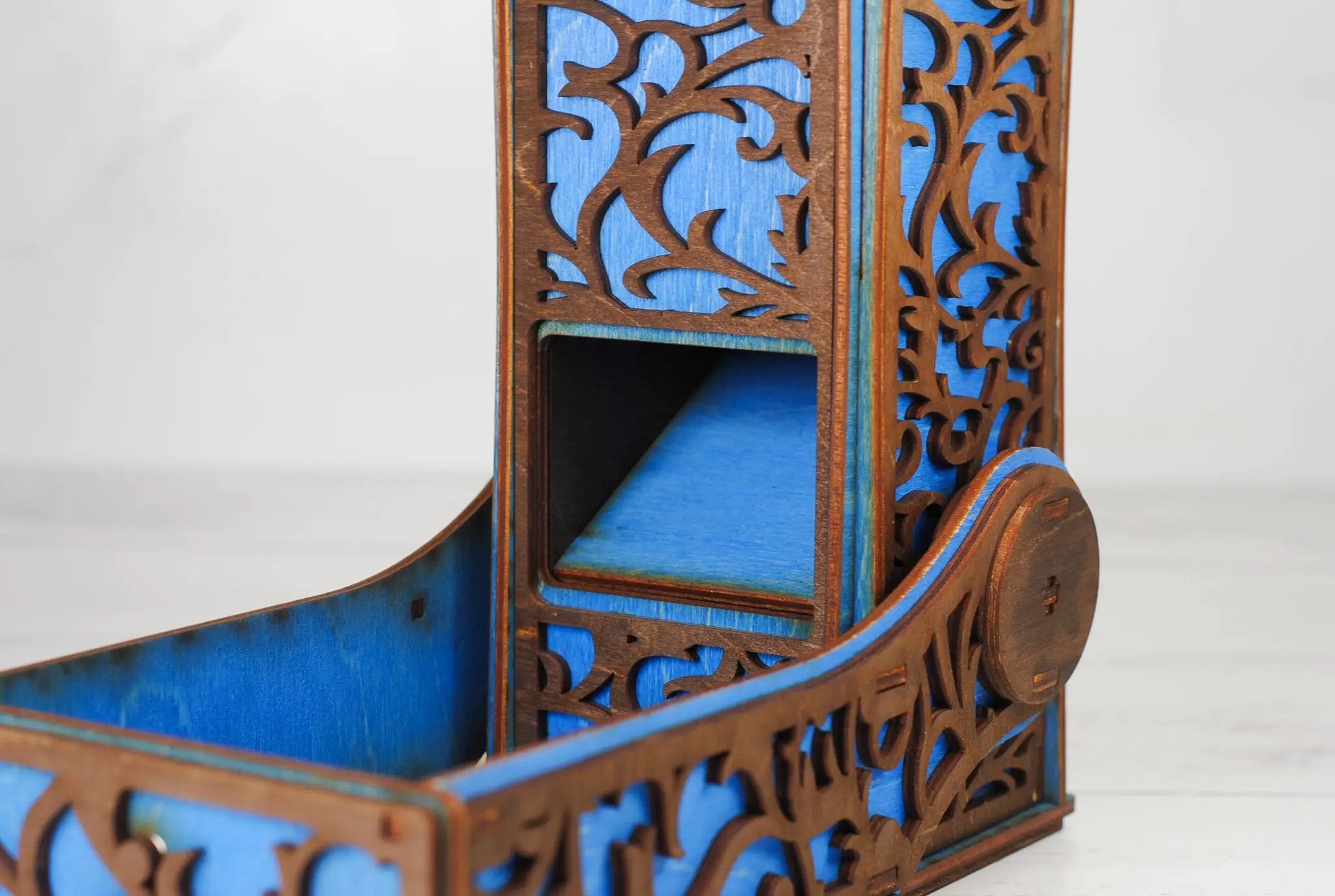 Black collapsible dice tower by Talon & Claw, shown folded and expanded, designed for tabletop gaming and dice rolling.