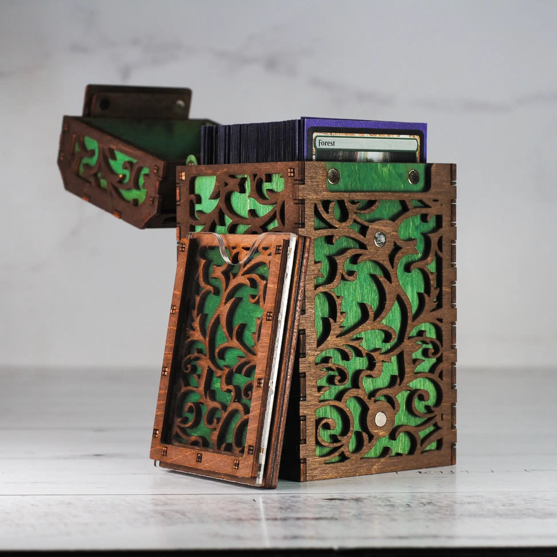 Black Talon & Claw Commander Deck Box with secure clasp and modern design for storing and protecting trading cards.