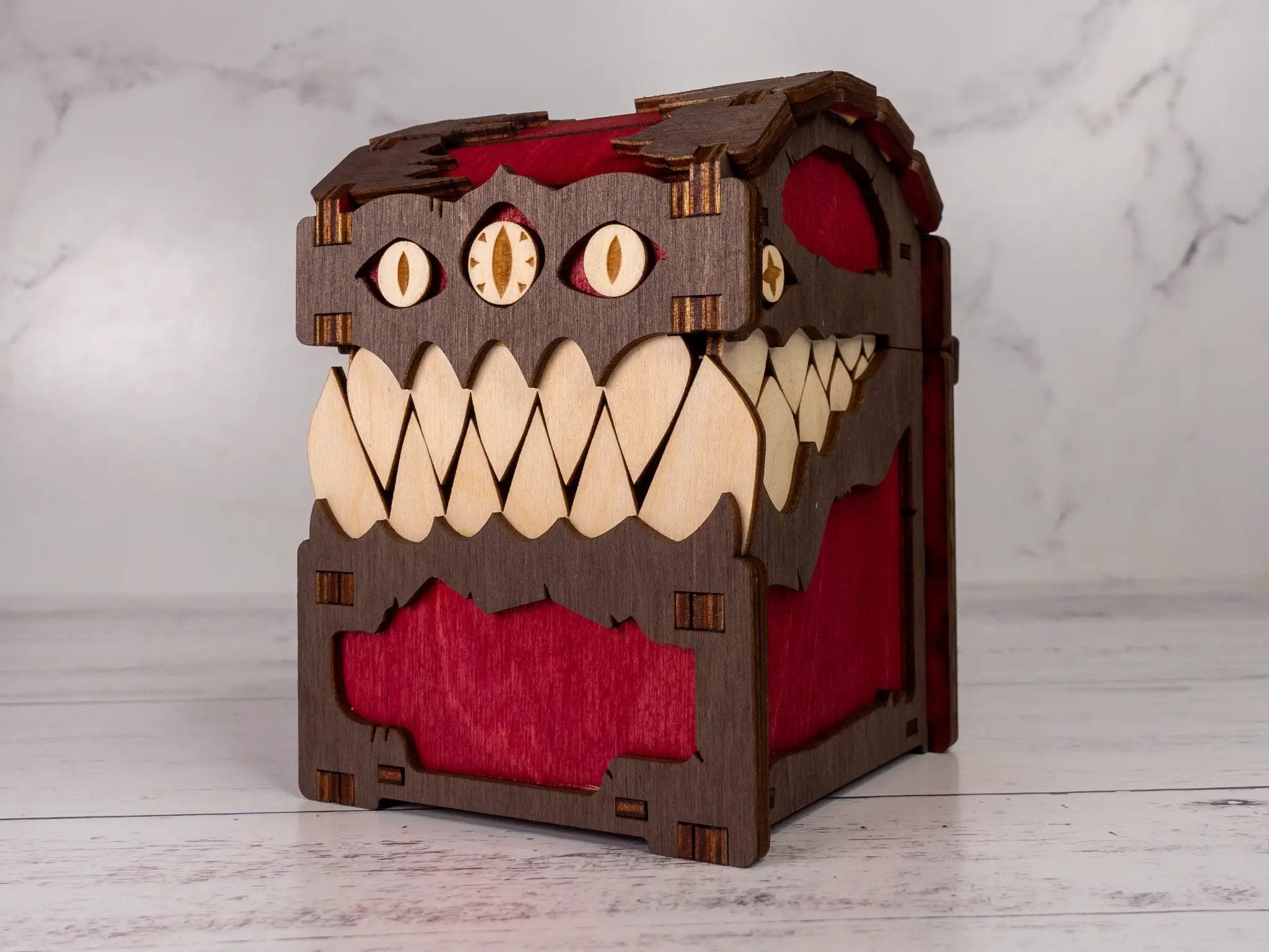 Black Mimic Chest Deck Box by Talon & Claw, featuring a detailed mimic creature design for card storage.