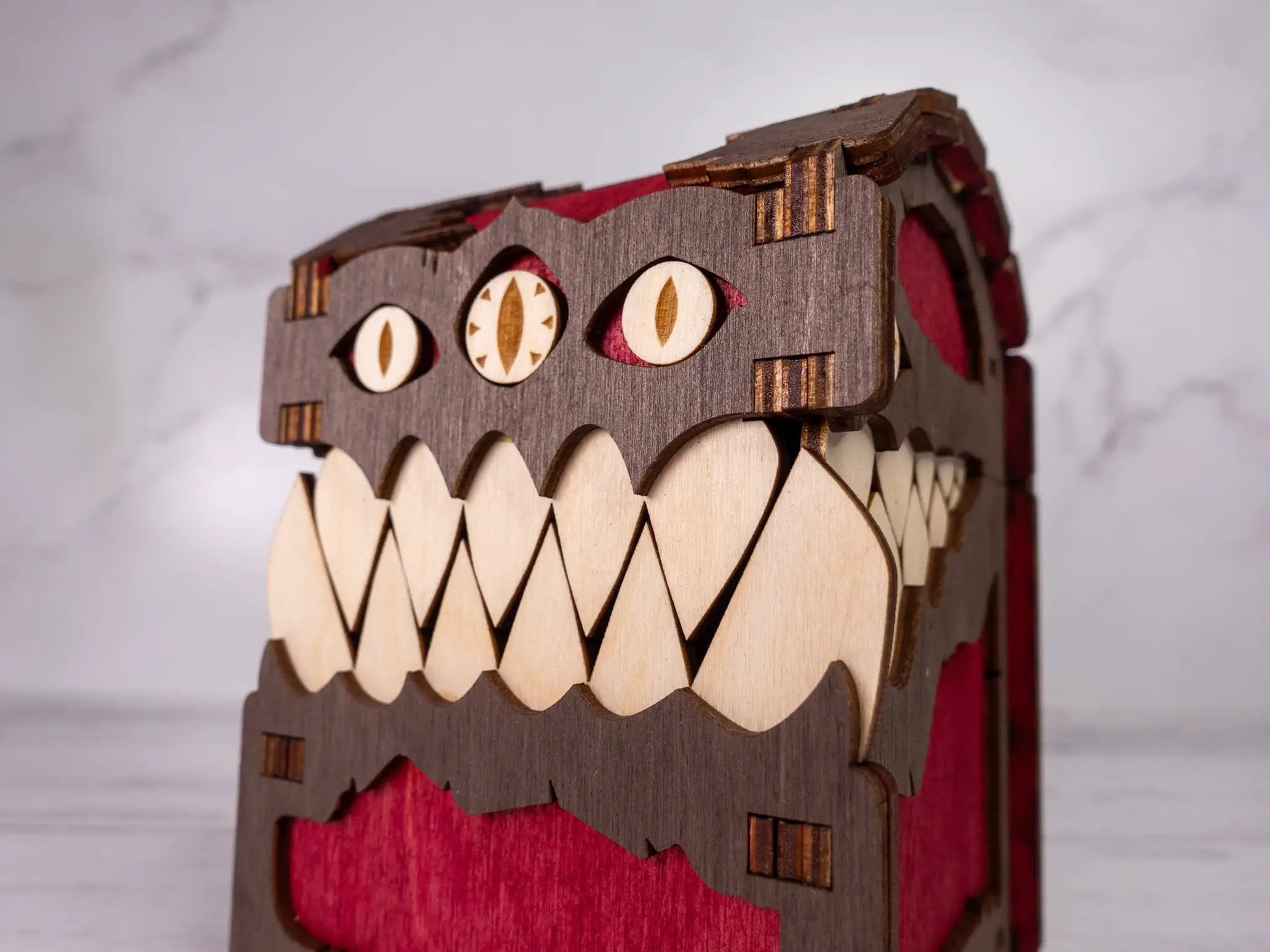 Black Mimic Chest Deck Box by Talon & Claw, featuring a detailed mimic creature design for card storage.