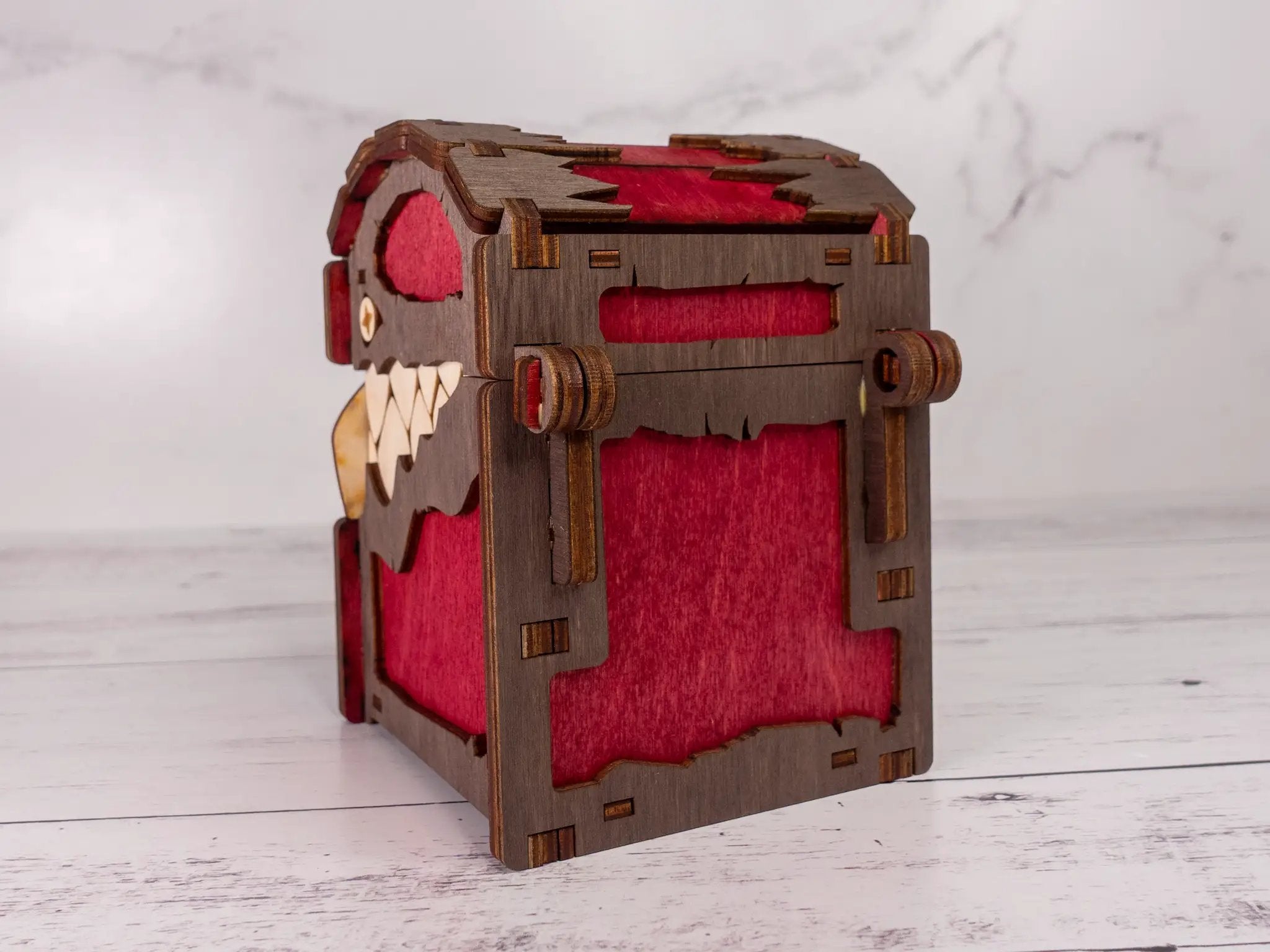 Black Mimic Chest Deck Box by Talon & Claw, featuring a detailed mimic design and secure lid for card storage.