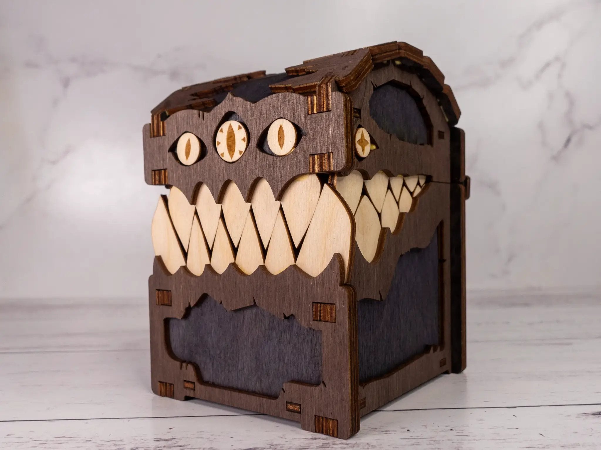 Black Mimic Chest Deck Box by Talon & Claw, featuring a detailed mimic monster design for collectible card storage.