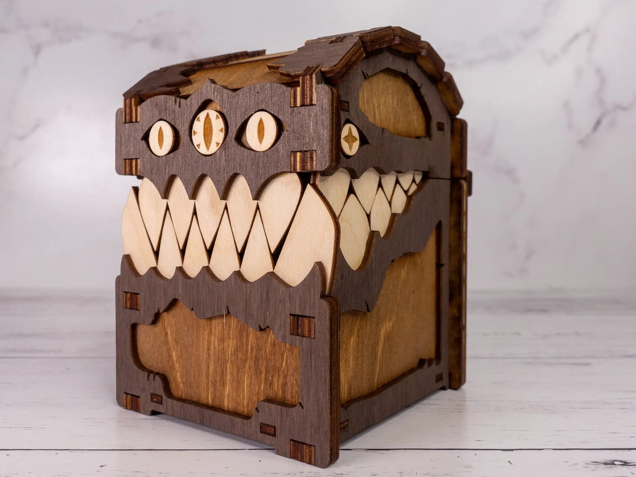 Black Mimic Chest Deck Box by Talon & Claw with detailed mimic face design and sturdy construction for card storage.