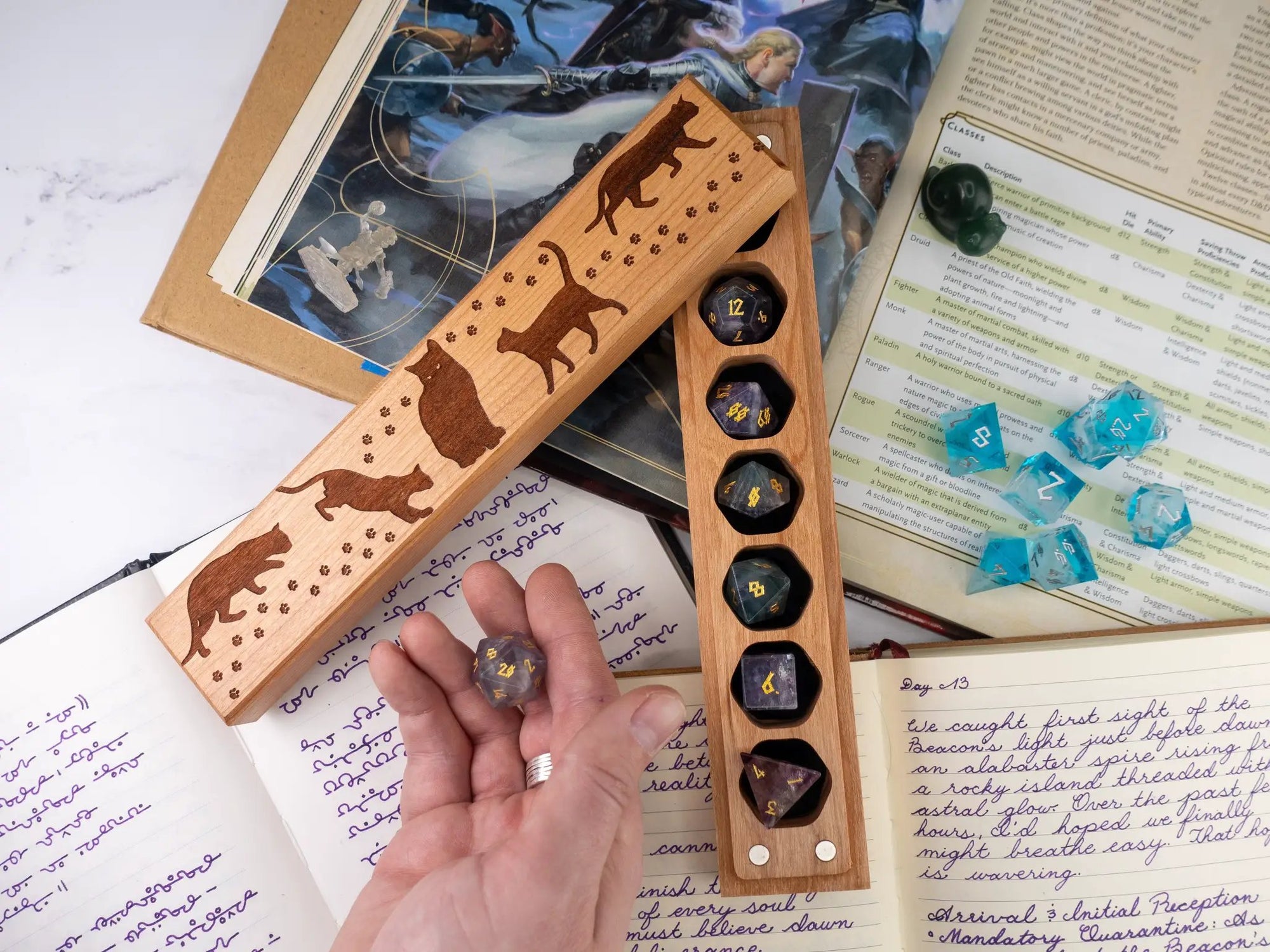 Engraved cherry wood Cats Dice Vault by Talon & Claw featuring intricate feline designs and the Council of 7 emblem.