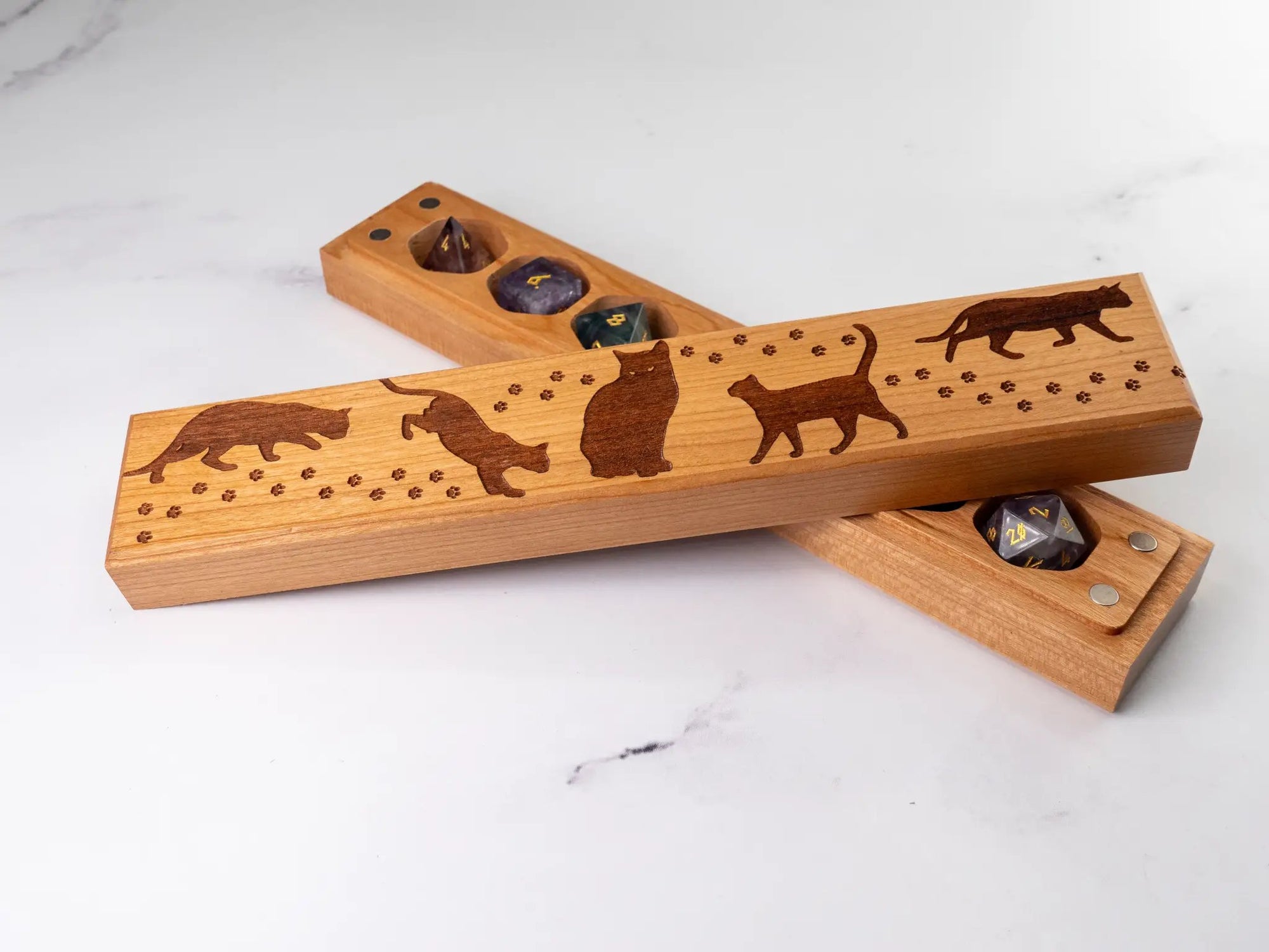 Cherry wood Talon & Claw dice vault engraved with cats, designed to securely store the Council of 7 dice.