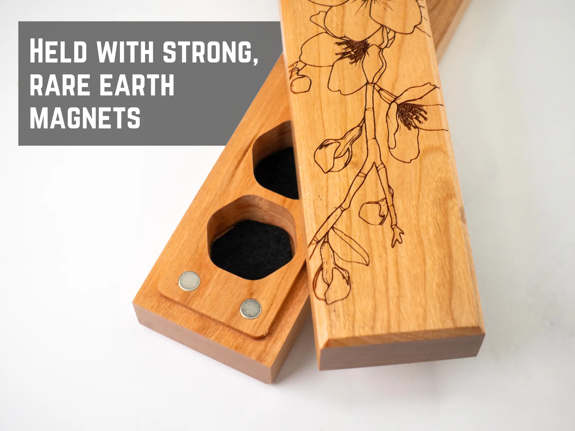 Talon & Claw engraved cherry blossom dice vault with intricate cherry blossom designs for storing council of 7 dice.