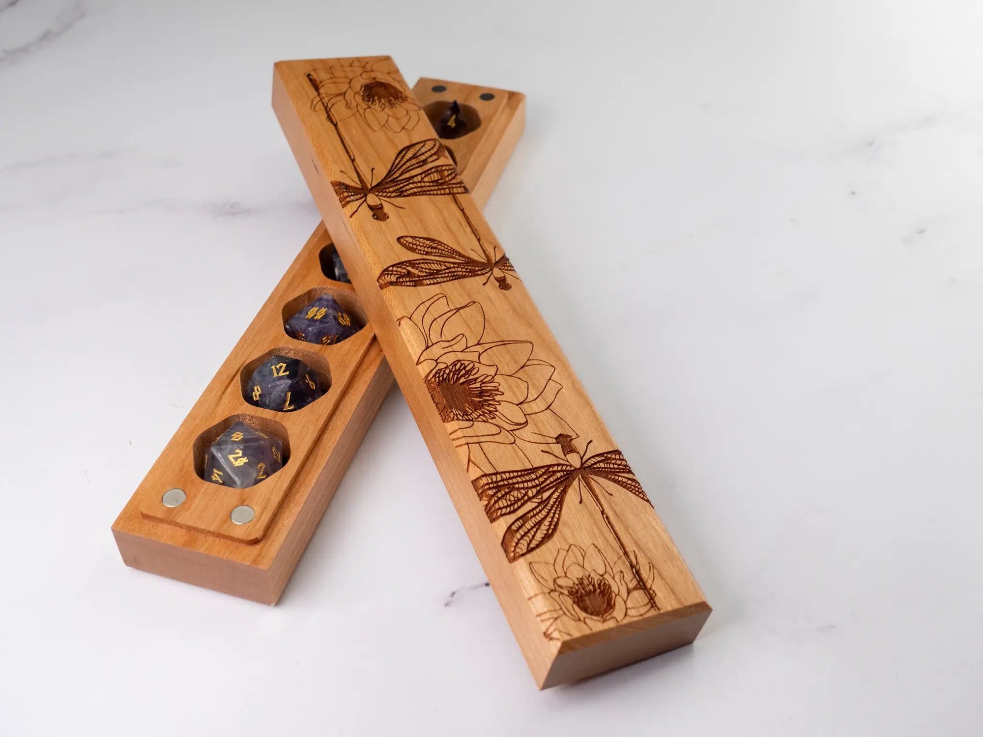 Talon & Claw engraved cherry dice vault featuring dragonfly design, for storing a set of seven dice.