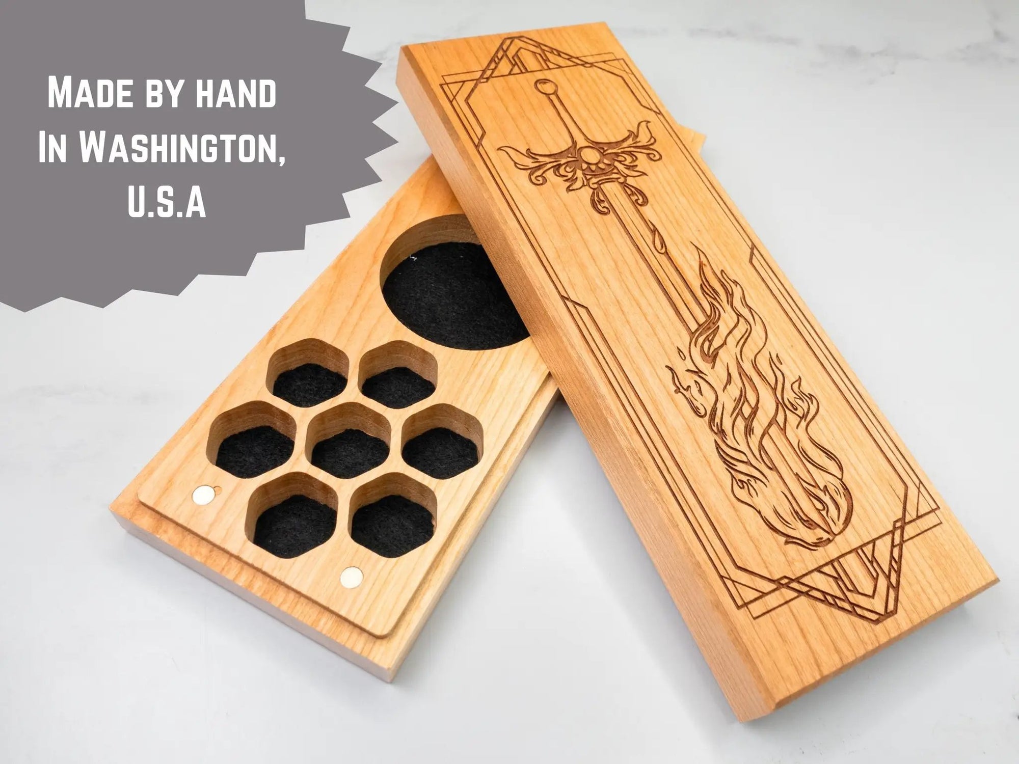 Purpleheart dice vault with flaming sword design by Talon & Claw, featuring dual hex compartments for tabletop gaming accessories.