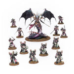 Emperor’s Children Blissbound Warband miniatures from Warhammer 40K, featuring ornate armor and detailed weaponry in vibrant colors.