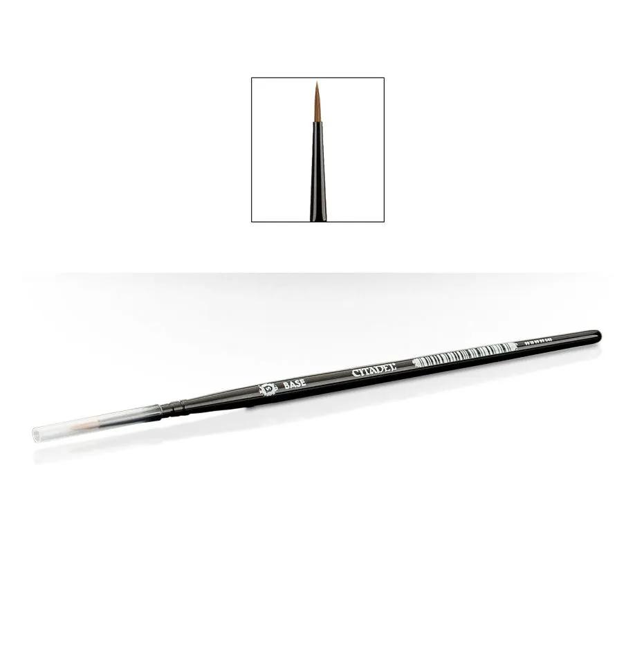 Close-up of THE MIGHTY HOBBY SHOP S Base Brush for miniature painting, showing the fine bristles and ergonomic handle.