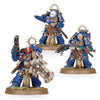 Ultramarines Space Marines Bladeguard Veteran Squad miniatures from THE MIGHTY HOBBY SHOP, featuring detailed armor and weaponry.