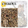 A collection of Warhammer Citadel Skulls miniature accessories with detailed skull designs for tabletop gaming and model decoration.
