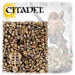 A collection of Warhammer Citadel Skulls miniature accessories with detailed skull designs for tabletop gaming and model decoration.