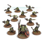 Warhammer Ork Gretchin miniature figure from THE MIGHTY HOBBY SHOP, showing detailed green orc character with weapons and armor.