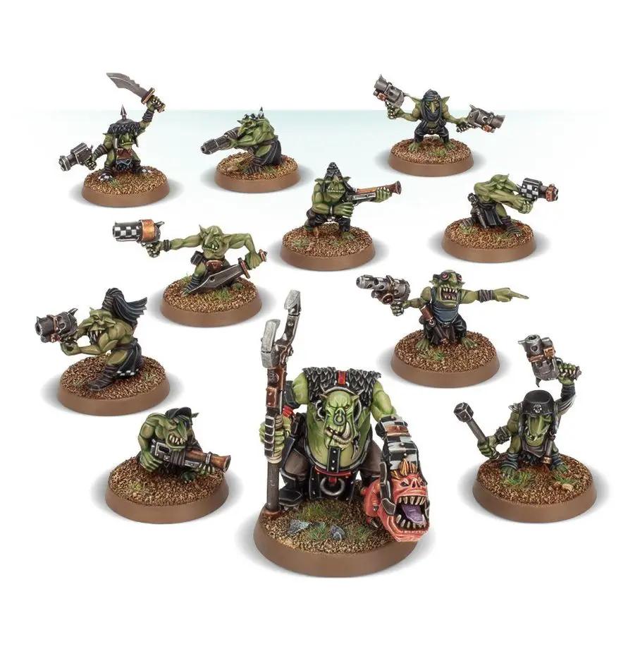 Warhammer Ork Gretchin miniature figure from THE MIGHTY HOBBY SHOP, showing detailed green orc character with weapons and armor.