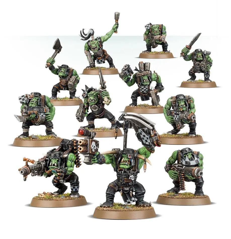 Warhammer Orks Boyz miniature by THE MIGHTY HOBBY SHOP, showing green-skinned Ork soldiers with weapons and armor.