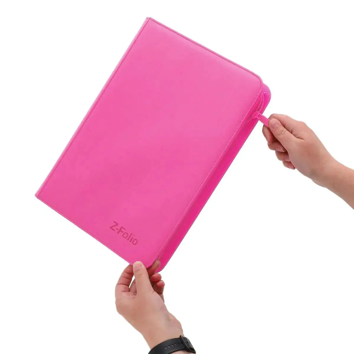 Pink Z-Folio 9-pocket album by THE MIGHTY HOBBY SHOP with a hand zipper closure, designed for storing collectible cards.
