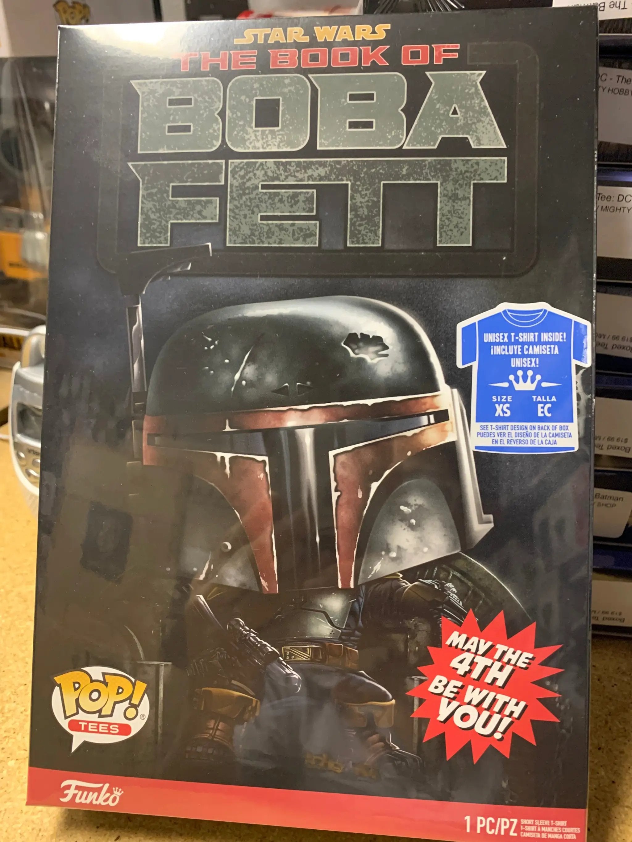 Boxed Star Wars Boba Fett T-shirt from THE MIGHTY HOBBY SHOP, featuring a graphic of the iconic bounty hunter on the front.