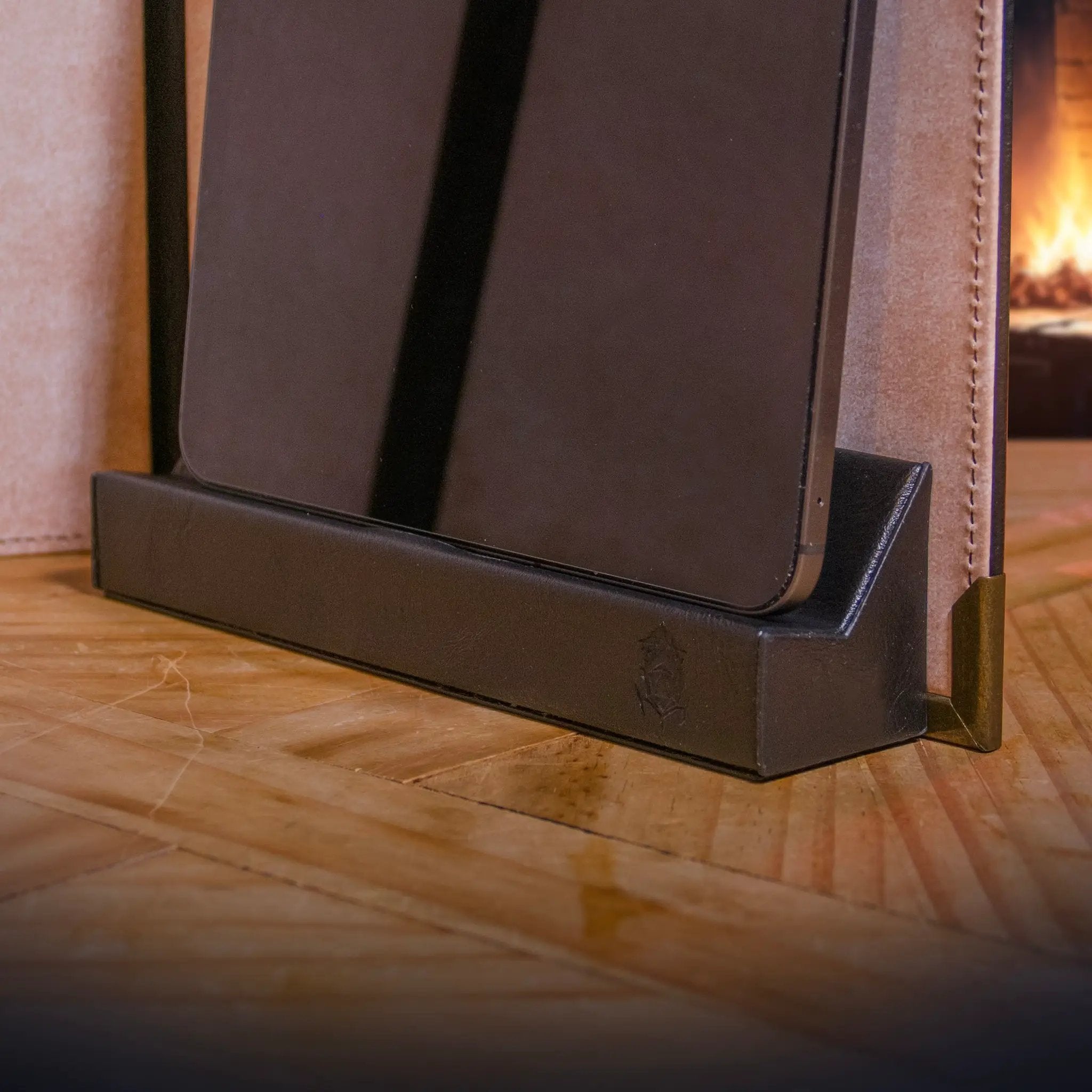 Brown magnetic tablet holder for digital display, designed for game master screens and D&D tools by The Ultimate Game Master.