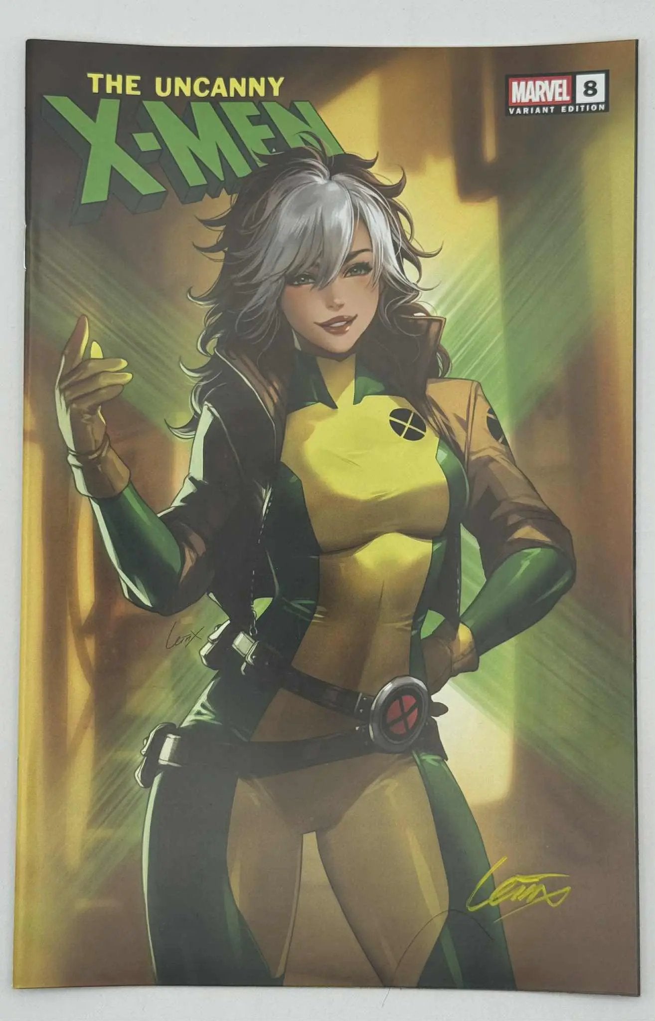 Signed Uncanny X-Men #8 comic book by Leirix from Unknown Comic Books, featuring vibrant cover art and unique signature.