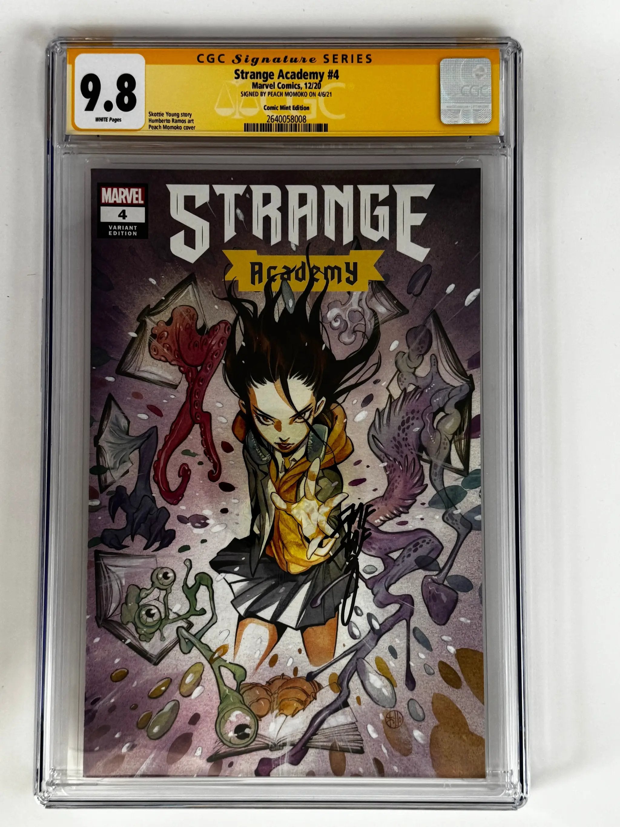 Comic book image of Strange Academy #4 Peach Momoko variant signed by Peach Momoko, graded CGC 9.8 with yellow label.